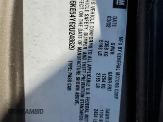 2002 Cadillac DeVille DHS z VIN 1G6KE54Y62U248629, wystawiony jako Copart lot #79825284 z przebiegiem 99 568 mil mil oraz Szkoda całkowita • Salvage title. Historia ofert i sprzedaży dostępna na DreamBid. Obrazek 12.