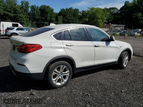 2015 BMW X4 xDrive28i with VIN 5UXXW3C51F0M89005, listed as a Copart auction lot 57392984 with 142,385 mi miles. Bid and sale history available at carsss.com. Image 3.