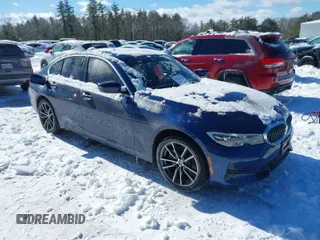 2019 BMW 3 Series 330i xDrive with VIN WBA5R7C59KAJ82495, listed as a IAAI auction lot 41597332 with 79,192 mi miles. Bid and sale history available at carsss.com. Image 1.