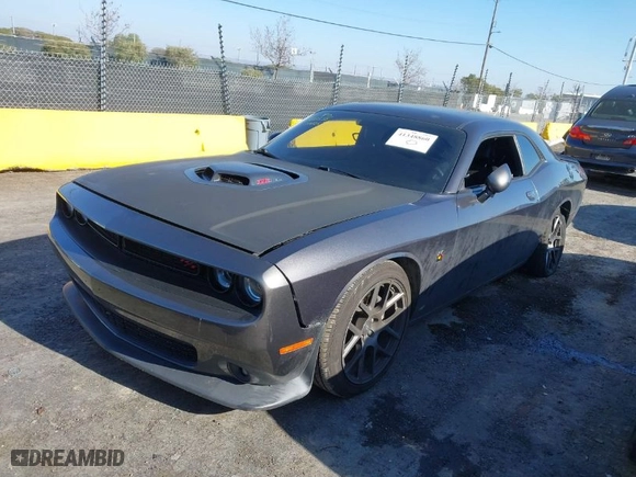 2019 Dodge Challenger R/T Scat Pack with VIN 2C3CDZFJXKH723881, listed as a IAAI auction lot 41348860 with 67,472 mi miles. Bid and sale history available at carsss.com. Image 2.
