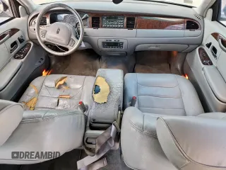 2000 Lincoln Town Car Signature with VIN 1LNHM82W9YY774120, listed as a Copart auction lot 59328725 with 137,910 mi miles and Salvage title. Bid and sale history available at DreamBid. Image 8.
