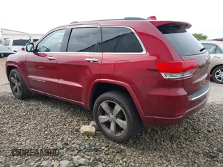 2015 Jeep Grand Cherokee High Altitude with VIN 1C4RJECG7FC884942, listed as a IAAI auction lot 41852796 with 110,454 mi miles. Bid and sale history available at carsss.com. Image 3.