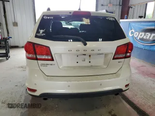 2013 Dodge Journey SXT with VIN 3C4PDDBG1DT521452, listed as a Copart auction lot 62660785 with 177,945 mi miles and Salvage title. Bid and sale history available at DreamBid. Image 6.