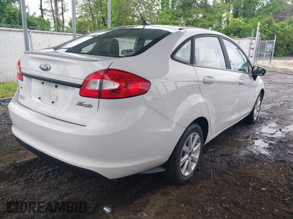 2011 Ford Fiesta SE z VIN 3FADP4BJ5BM207676, wystawiony jako IAAI lot #42263307 z przebiegiem 139 929 mil mil oraz . Historia ofert i sprzedaży dostępna na DreamBid. Obrazek 4.
