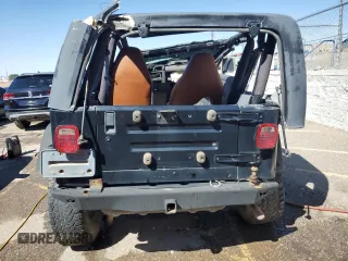 2002 Jeep Wrangler X with VIN 1J4FA39S12P748127, listed as a Copart auction lot 66538073 with Not Provided miles and Non Repairable. Bid and sale history available at carsss.com. Image 6.
