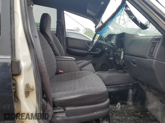 2001 Jeep Cherokee Sport with VIN 1J4FF48S41L611052, listed as a Copart auction lot 59667135 with 270,448 mi miles and Clean title. Bid and sale history available at DreamBid. Image 7.