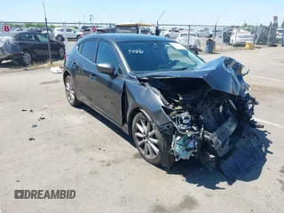 2017 Mazda 3 Grand Touring z VIN JM1BN1M36H1139091, wystawiony jako IAAI lot #42203375 z przebiegiem Nie podano mil oraz . Historia ofert i sprzedaży dostępna na DreamBid. Obrazek 1.
