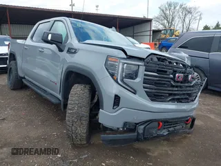 2024 GMC Sierra 1500 AT4 with VIN 1GTUUEE8XRZ205772, listed as a IAAI auction lot 41962663 with 12,215 mi miles and . Bid and sale history available at DreamBid. Image 1.