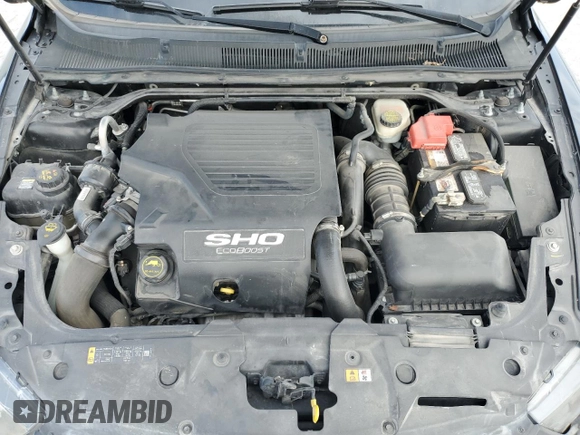 2015 Ford Taurus SHO z VIN 1FAHP2KTXFG121786, wystawiony jako Copart lot #49718275 z przebiegiem 114 946 mil mil oraz Szkoda całkowita • Salvage title. Historia ofert i sprzedaży dostępna na DreamBid. Obrazek 12.