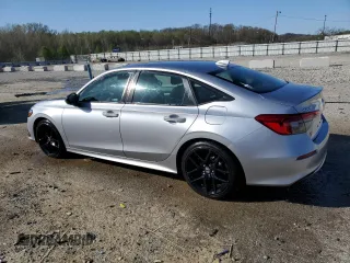 2022 Honda Civic Sport with VIN 2HGFE2F59NH563594, listed as a Copart auction lot 52135515 with 33,339 mi miles and Salvage Title. Bid and sale history available at carsss.com. Image 2.