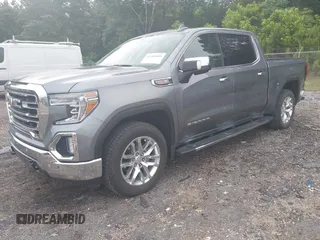 2022 GMC Sierra 1500 SLT with VIN 3GTU9DEL0NG132163, listed as a IAAI auction lot 42209503 with 44,924 mi miles and . Bid and sale history available at DreamBid. Image 2.