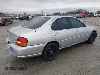 1999 Nissan Altima XE with VIN 1N4DL01D5XC180276, listed as a IAAI auction lot 41584645 with 248,376 mi miles. Bid and sale history available at carsss.com. Image 4.