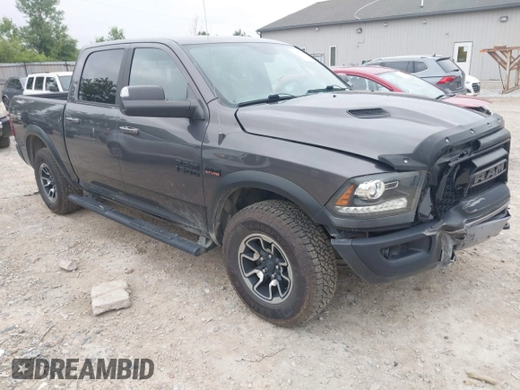 2017 Ram 1500 Rebel with VIN 1C6RR7YT5HS610293, listed as a IAAI auction lot 42454064 with 103,515 mi miles and . Bid and sale history available at DreamBid. Image 1.