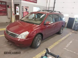 2011 Kia Sedona LX with VIN KNDMG4C78B6411157, listed as a IAAI auction lot 40671496 with 153,768 mi miles. Bid and sale history available at carsss.com. Image 2.