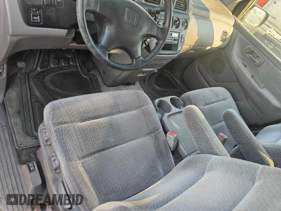2001 Honda Odyssey LX with VIN 2HKRL18501H617598, listed as a Copart auction lot 65471805 with 125,298 mi miles and Clean title. Bid and sale history available at DreamBid. Image 6.