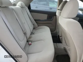 2006 Kia Spectra EX with VIN KNAFE121265208526, listed as a Copart auction lot 80300604 with 101,780 mi miles and Salvage Title. Bid and sale history available at carsss.com. Image 10.