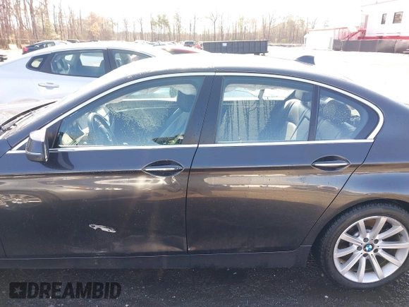 2015 BMW 5 Series 535i xDrive with VIN WBA5B3C55FD540905, listed as a IAAI auction lot 41892885 with 103,598 mi miles. Bid and sale history available at carsss.com. Image 14.