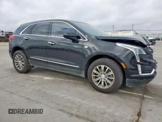 2019 Cadillac XT5 Luxury FWD with VIN 1GYKNCRS1KZ271223, listed as a Copart auction lot 50874195 with 29,843 mi miles and Salvage Title. Bid and sale history available at DreamBid. Image 4.