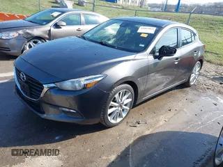 2017 Mazda 3 Touring with VIN 3MZBN1L70HM102817, listed as a IAAI auction lot 41867063 with 100,307 mi miles and . Bid and sale history available at DreamBid. Image 18.