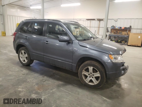 2007 Suzuki Grand Vitara Luxury z VIN JS3TD947774200407, wystawiony jako Copart lot #52001965 z przebiegiem Nie podano mil oraz Szkoda całkowita • Salvage title. Historia ofert i sprzedaży dostępna na DreamBid. Obrazek 4.