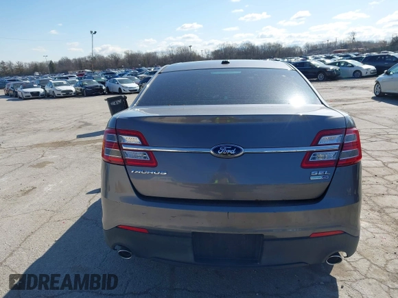 2013 Ford Taurus SEL z VIN 1FAHP2H83DG231000, wystawiony jako IAAI lot #41986420 z przebiegiem 200 390 mil mil oraz . Historia ofert i sprzedaży dostępna na DreamBid. Obrazek 16.