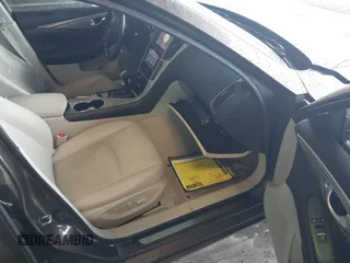 2015 Infiniti Q50 Premium z VIN JN1BV7AR0FM393387, wystawiony jako IAAI lot #42257850 z przebiegiem 176 436 mil mil oraz . Historia ofert i sprzedaży dostępna na DreamBid. Obrazek 5.