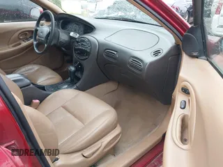1997 Ford Taurus z VIN 1FALP54N7VA137035, wystawiony jako IAAI lot #41778551 z przebiegiem 137 025 mil mil oraz . Historia ofert i sprzedaży dostępna na DreamBid. Obrazek 5.