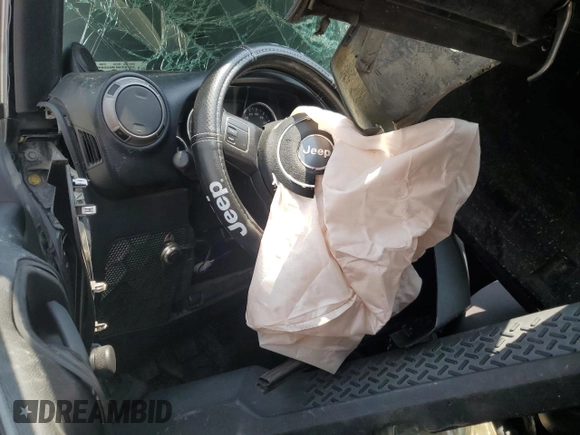 2013 Jeep Wrangler Sport with VIN 1C4AJWAG0DL696928, listed as a Copart auction lot 60822915 with 169,503 mi miles and Salvage title. Bid and sale history available at DreamBid. Image 8.