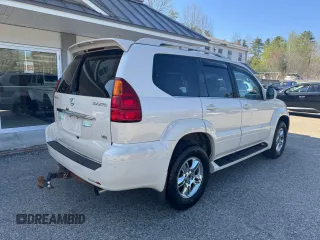 2003 Lexus GX 470 z VIN JTJBT20X830007160, wystawiony jako Copart lot #58235005 z przebiegiem 237 159 mil mil oraz Tytuł czysty. Historia ofert i sprzedaży dostępna na DreamBid. Obrazek 4.