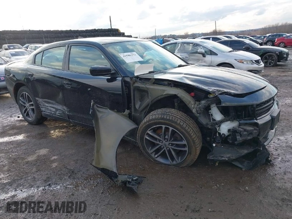 2019 Dodge Charger SXT with VIN 2C3CDXJG3KH630975, listed as a IAAI auction lot 41580174 with 74,575 mi miles and . Bid and sale history available at DreamBid. Image 1.