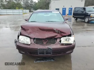 2001 Mazda 626 LX with VIN 1YVGF22D615249099, listed as a Copart auction lot 80753104 with 72,308 mi miles and Salvage Title. Bid and sale history available at carsss.com. Image 5.
