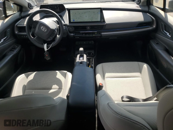 2024 Toyota Prius LE z VIN JTDADABU4R3021525, wystawiony jako Copart lot #61652045 z przebiegiem 2 120 mil mil oraz Szkoda całkowita • Salvage title. Historia ofert i sprzedaży dostępna na DreamBid. Obrazek 8.