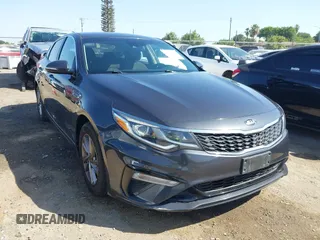 2019 Kia Optima LX z VIN 5XXGT4L33KG321471, wystawiony jako IAAI lot #42409759 z przebiegiem 116 683 mil mil oraz . Historia ofert i sprzedaży dostępna na DreamBid. Obrazek 1.