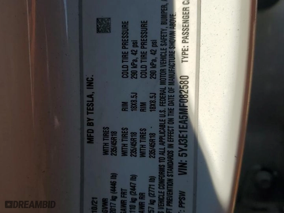 2021 Tesla Model 3 Standard Range Plus with VIN 5YJ3E1EA5MF082580, listed as a Copart auction lot 70601674 with 0 mi miles and Salvage Title. Bid and sale history available at carsss.com. Image 12.