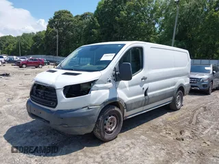 2018 Ford Transit with VIN 1FTYE1YM4JKA83438, listed as a IAAI auction lot 39881520 with 164,789 mi miles and . Bid and sale history available at carsss.com. Image 18.