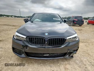 2018 BMW 5 Series 540i xDrive with VIN WBAJE7C52JWD52730, listed as a Copart auction lot 60297425 with 104,208 mi miles and Salvage title. Bid and sale history available at DreamBid. Image 5.