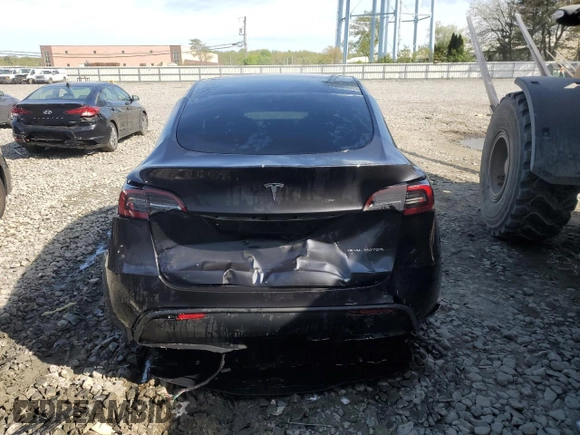 2024 Tesla Model Y Long Range with VIN 7SAYGDEE7RA307013, listed as a Copart auction lot 54767595 with 12,953 mi miles and Salvage Title. Bid and sale history available at DreamBid. Image 6.