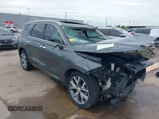 2021 Hyundai Palisade SEL z VIN KM8R34HEXMU283703, wystawiony jako IAAI lot #41894115 z przebiegiem 113 630 mil mil oraz . Historia ofert i sprzedaży dostępna na DreamBid. Obrazek 1.