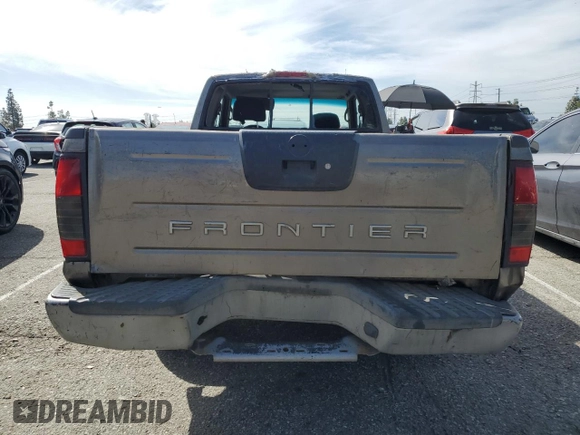 2003 Nissan Frontier XE z VIN 1N6DD26T63C454580, wystawiony jako Copart lot #49132485 z przebiegiem 310 840 mil mil oraz Szkoda całkowita • Salvage title. Historia ofert i sprzedaży dostępna na DreamBid. Obrazek 6.