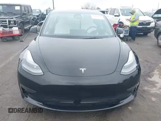 2023 Tesla Model 3 with VIN 5YJ3E1EA0PF587656, listed as a IAAI auction lot 41489586 with 12,844 mi miles and . Bid and sale history available at DreamBid. Image 13.