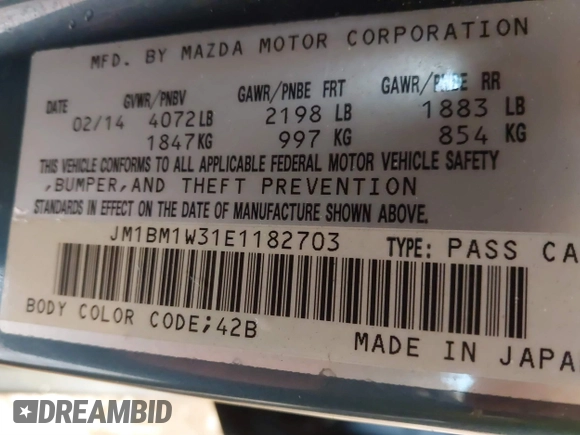 2014 Mazda 3 S Grand Touring with VIN JM1BM1W31E1182703, listed as a IAAI auction lot 41470742 with 123,956 mi miles and . Bid and sale history available at DreamBid. Image 9.