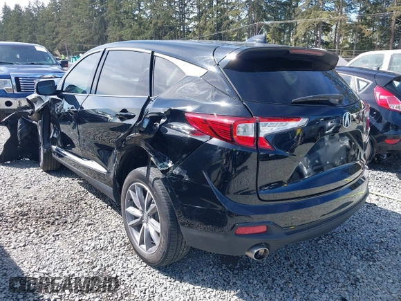 2021 Acura RDX w/Technology Package with VIN 5J8TC2H55ML006429, listed as a IAAI auction lot 42030813 with 42,712 mi miles. Bid and sale history available at carsss.com. Image 3.