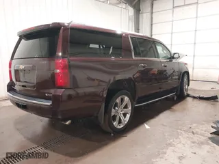 2017 Chevrolet Suburban Premier with VIN 1GNSKJKC4HR302244, listed as a IAAI auction lot 40850765 with 180,694 mi miles. Bid and sale history available at carsss.com. Image 4.