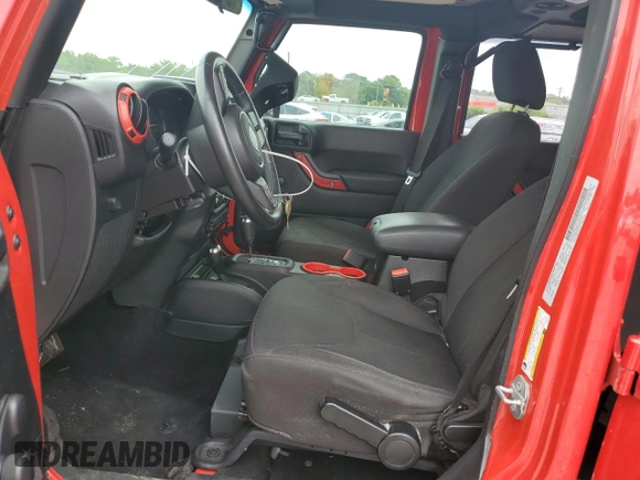 2015 Jeep Wrangler Unlimited Sport with VIN 1C4BJWDG6FL568082, listed as a Copart auction lot 58242945 with 114,637 mi miles and Salvage title. Bid and sale history available at DreamBid. Image 7.