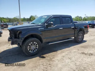 2015 Ford F-150 XLT with VIN 1FTEW1EFXFFC68941, listed as a Copart auction lot 52002825 with 152,805 mi miles and Salvage title. Bid and sale history available at DreamBid. Image 1.