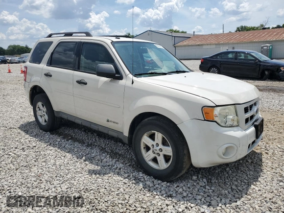 2009 Ford Escape Hybrid with VIN 1FMCU59309KC19243, listed as a Copart auction lot 61416915 with 74,732 mi miles and Salvage title. Bid and sale history available at DreamBid. Image 4.