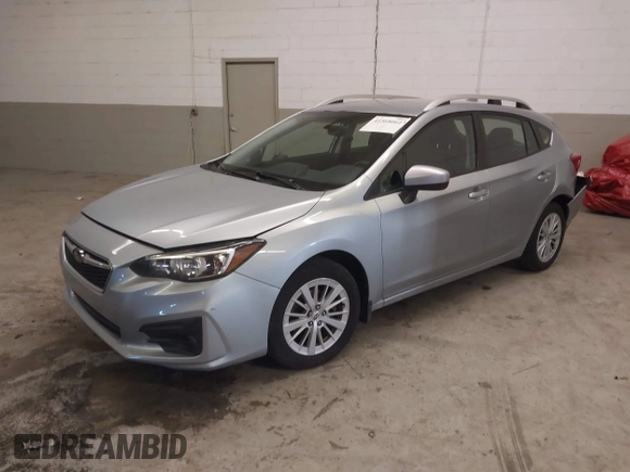 2017 Subaru Impreza Premium z VIN 4S3GTAB63H3705818, wystawiony jako IAAI lot #41568064 z przebiegiem 132 046 mil mil oraz . Historia ofert i sprzedaży dostępna na DreamBid. Obrazek 17.