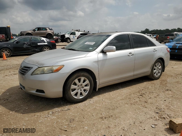 2007 Toyota Camry Hybrid with VIN JTNBB46K773026909, listed as a Copart auction lot 54583065 with 168,625 mi miles and Clean Title. Bid and sale history available at carsss.com. Image 1.