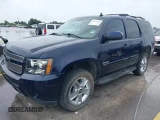 2007 Chevrolet Tahoe LT with VIN 1GNFC13J47R244713, listed as a IAAI auction lot 42632365 with 196,527 mi miles and . Bid and sale history available at DreamBid. Image 2.
