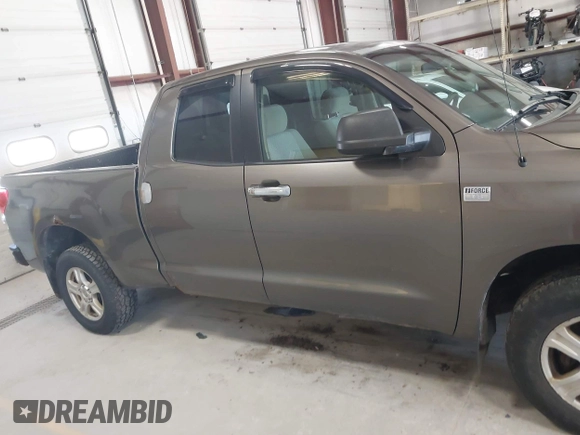 2007 Toyota Tundra SR5 with VIN 5TFBT54137X006800, listed as a IAAI auction lot 42061641 with 186,139 mi miles and . Bid and sale history available at DreamBid. Image 13.